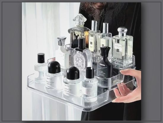 Picture of Clear Acrylic Perfume Display Ladder – 3-Layer Cosmetic Storage Rack, Stylish & Space-Saving